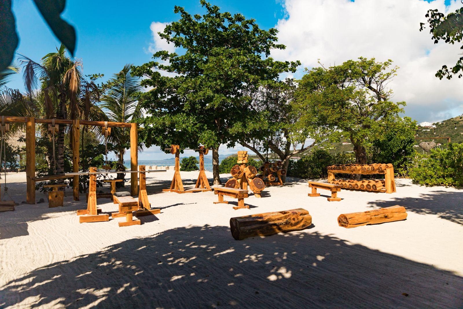 Natural wooden training equipment on an open beach